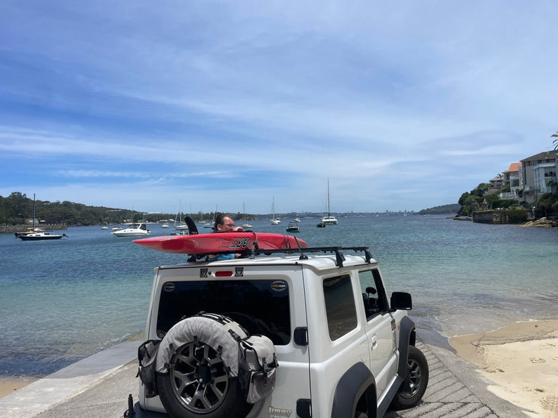 How to Tie Down Your Kayak, Surfboard, or SUP Like a Pro