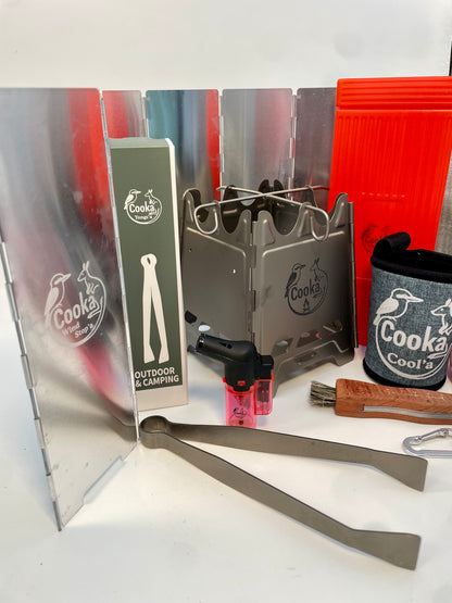 Cooka Hiker Kit with the Wind Stop'a wind shield around the titanium folding stove, titanium tongs and Light'a lighter