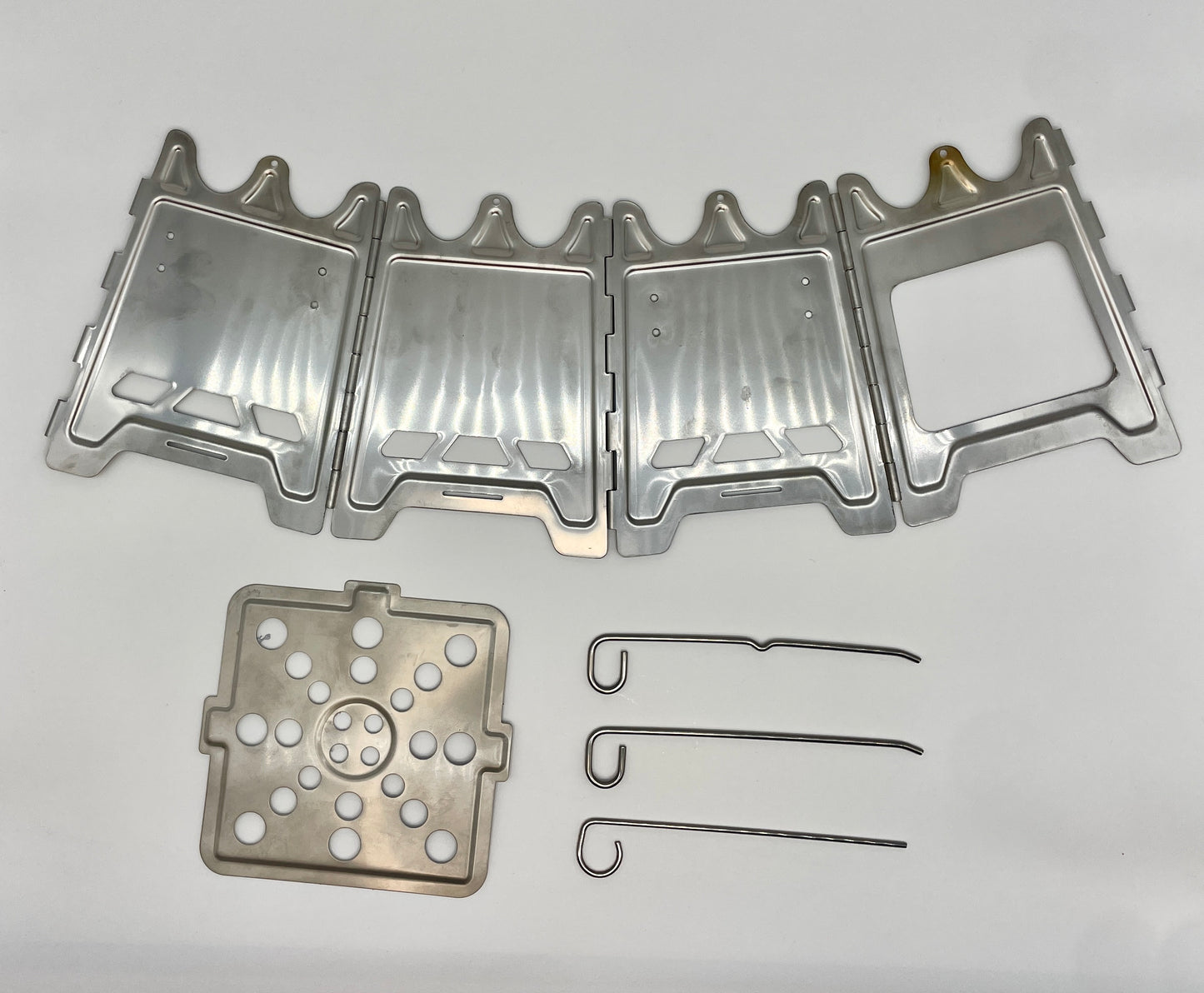 Cooka Camp Stove components and accessories laid flat