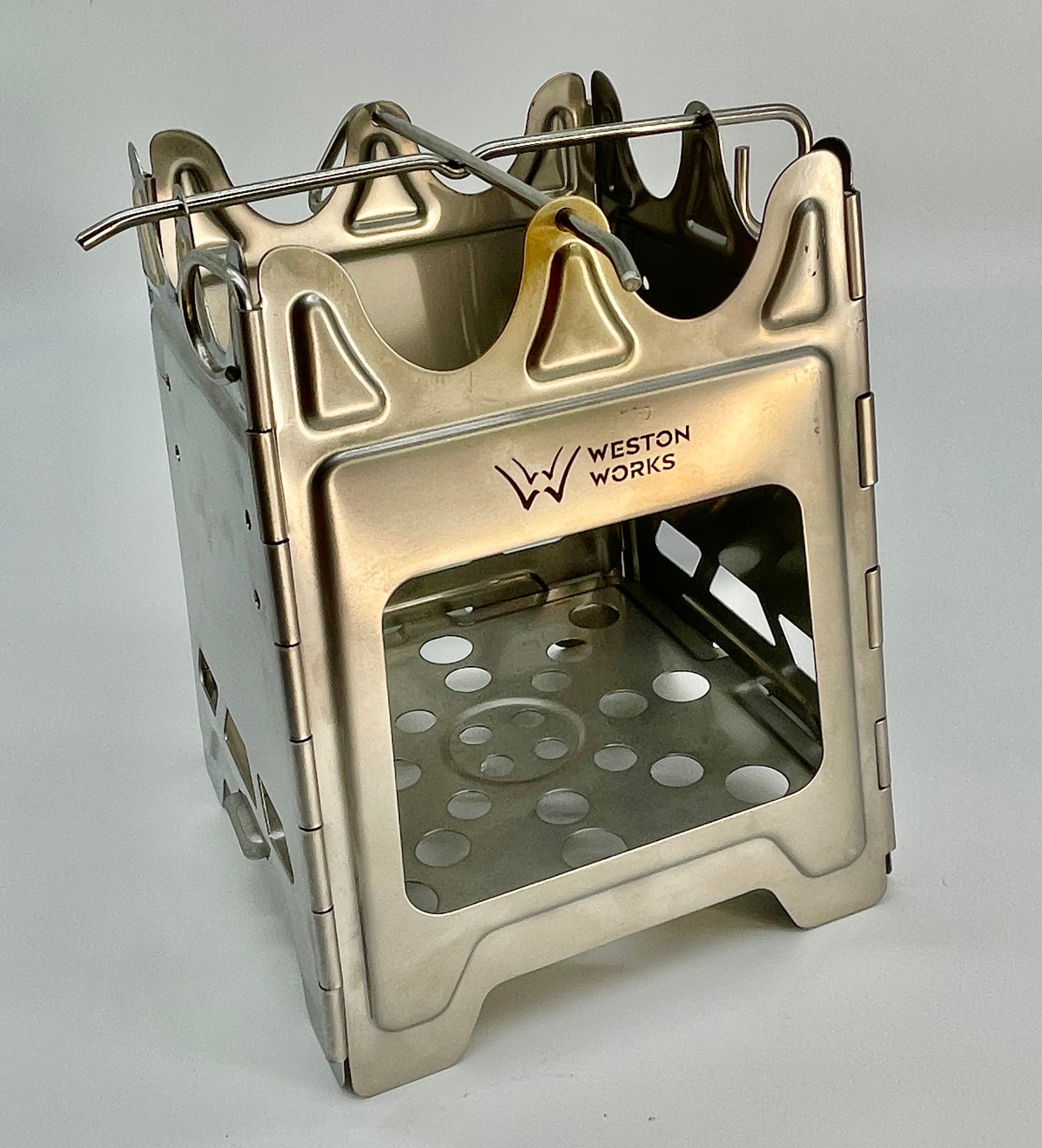 Cooka Camp Stove side view showing four-legged base and construction